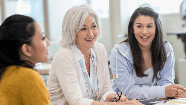 Group of teachers talking.