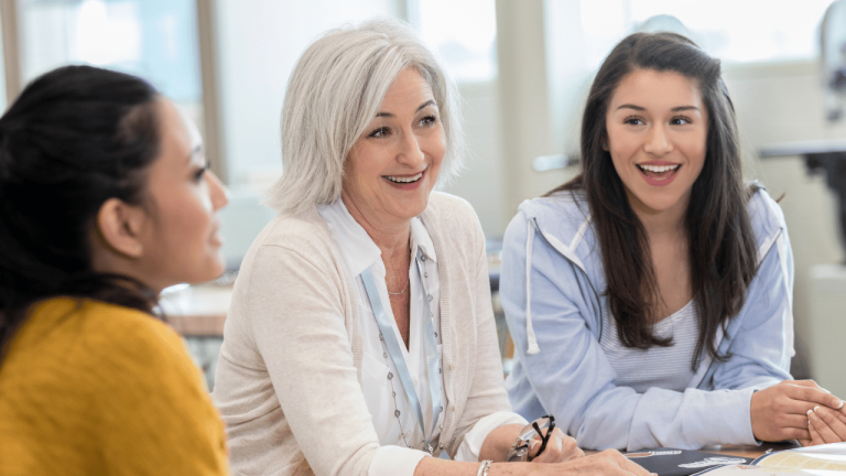 Group of teachers talking.